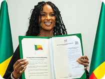 Woman holding a document with the Benin flag